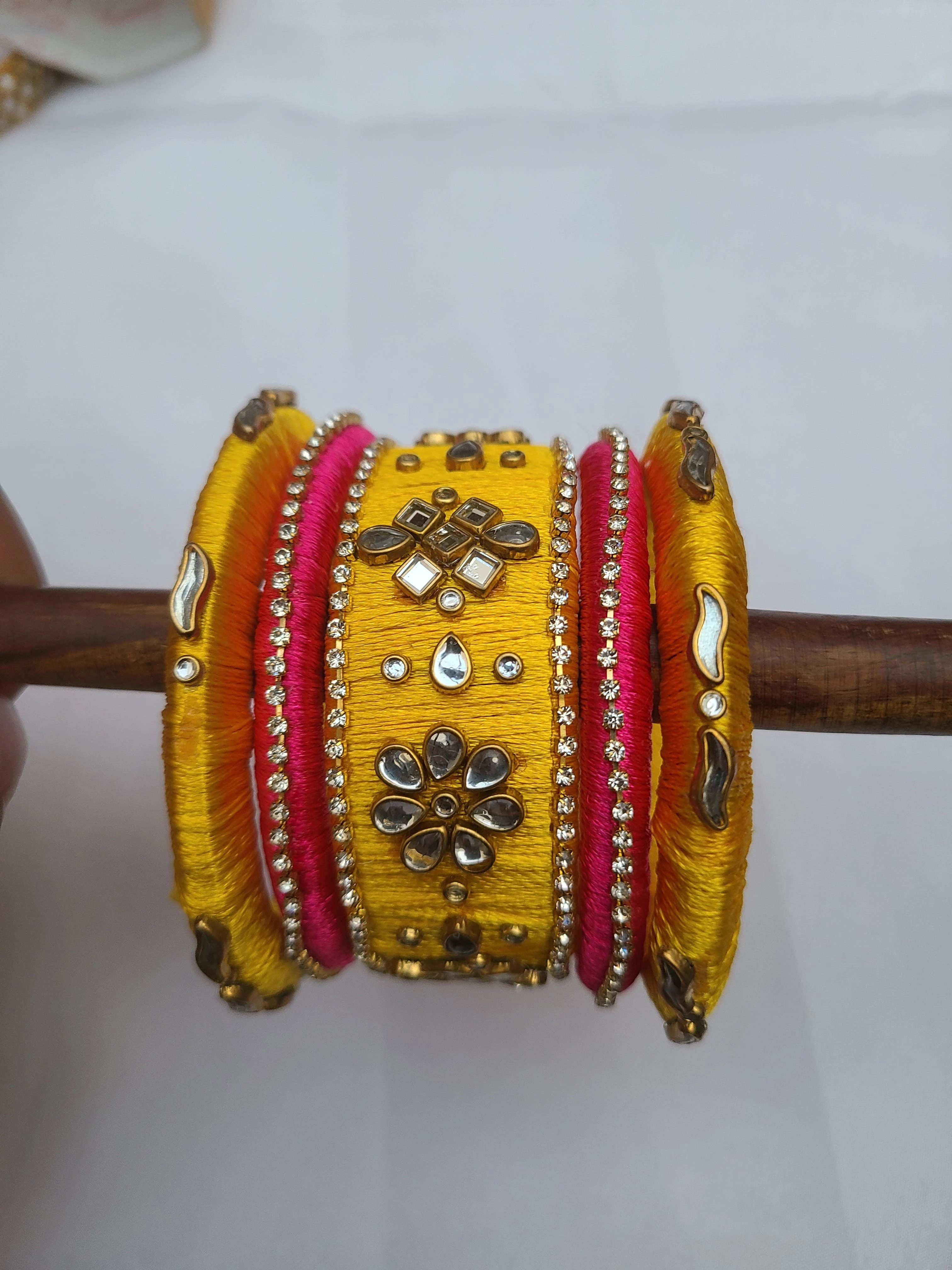 Yellow Fancy Silk Thread Kundan Bangles